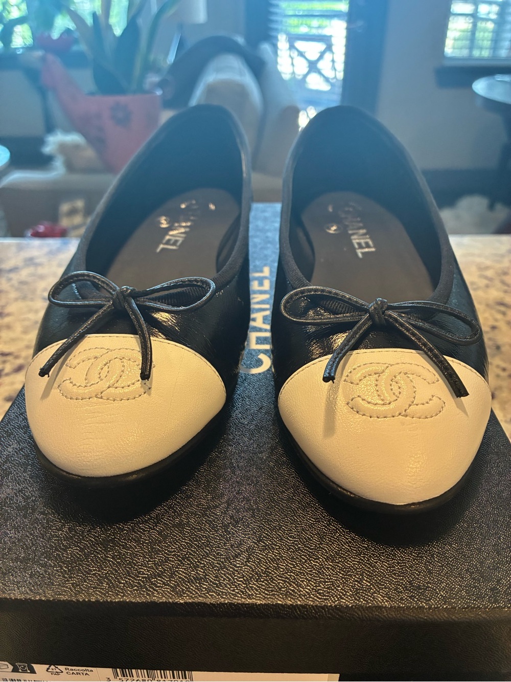 CHANEL Black Leather Ballet Flats with White Cap Toe and Bow - Picture 9 of 10